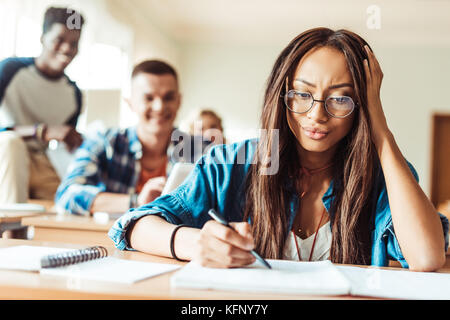 student girl studying in classroom Stock Photo