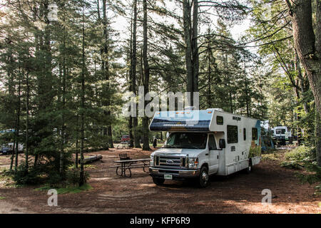 Canada Ontario Algonquin National Park 30.09.2017 - Parked RV camper car at Lake of two rivers Campground Beautiful natural forest landscape Stock Photo