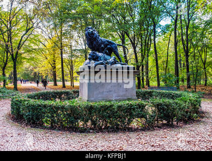 Berlin,Mitte,Tiergarten public park.Bronze sculpture of group of lions - lion, dying lioness and two cubs  by sculptor, Wilhem Wolff 1872 Stock Photo