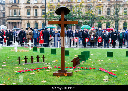 Glasgow, UK. 31st Oct, 2017. In heavy rain, a number of senior military personnel, political dignitaries including EVA BOLANDER, the Provost of Glasgow and a number of ex-service men and women laid poppy wreathes at the official opening of the Garden of Remembrance in George Square, Glasgow Credit: Findlay/Alamy Live News Stock Photo