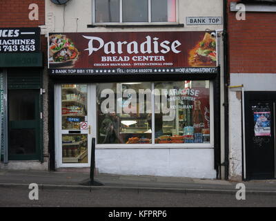 Blackburn, takeaway capital. Fast food capital. Fast food outlets on Bank Top. Across the road from St. Wilfred's High School. Stock Photo