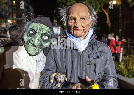 New York, USA. 31st Oct, 2017. Revelers wear costumes as they march through New York's 6th Avenue during the Greenwich Village Halloween Parade. Credit: Enrique Shore/Alamy Live News Stock Photo