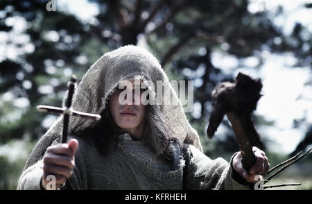 Fairy magician. A sorcerer with a glass sphere, a magical spell  Stock Photo