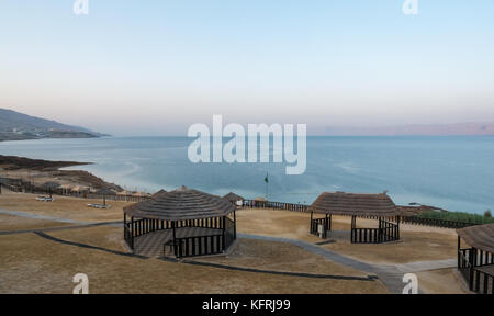 Early morning light at Holiday Inn Dead Sea beach resort, no people on the beach and view over Dead Sea, Jordan, Middle East Stock Photo