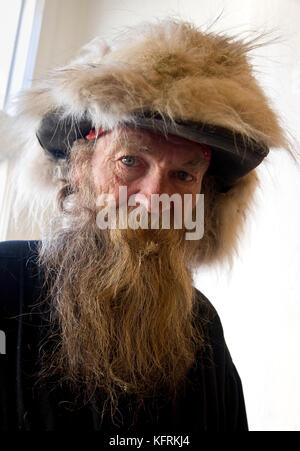 Old western man in Santa Fe, New Mexico with fur hat Stock Photo