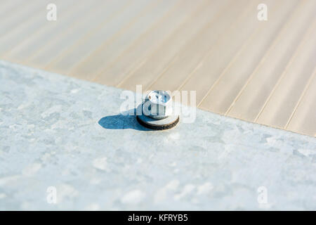 Close up metal nut on bolt Stock Photo