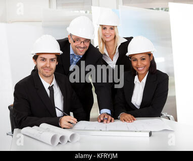 Group of architects at the meeting discussing the project Stock Photo