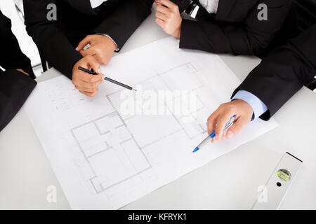 Group of architects at the meeting discussing the project Stock Photo