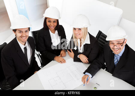 Group of architects at the meeting discussing the project Stock Photo