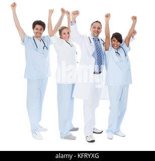 Group of doctors celebrating success. Isolated on white Stock Photo