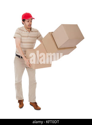 Delivery man with falling stack of boxes. Isolated on white Stock Photo