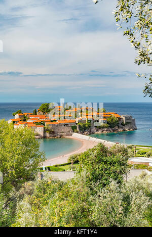 Sveti Stefan is a small islet holiday resort on the Adriatic coast of Montenegro Not far from Budva. Stock Photo