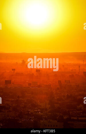Sun and sunspots seen at sunset over the city of Hermosillo Sonora, one of the hottest in Mexico.  Photo:Luis Gutierrez/NortePhoto.com Stock Photo
