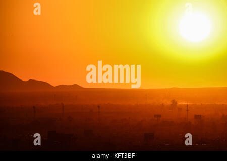Sun and sunspots seen at sunset over the city of Hermosillo Sonora, one of the hottest in Mexico.  Photo:Luis Gutierrez/NortePhoto.com Stock Photo