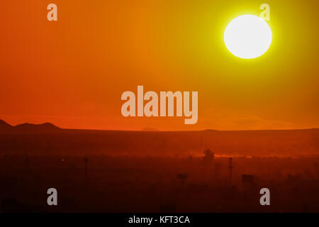 Sun and sunspots seen at sunset over the city of Hermosillo Sonora, one of the hottest in Mexico.  Photo:Luis Gutierrez/NortePhoto.com Stock Photo