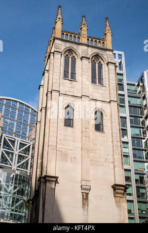 The tower of the church of St. Alban, located on Wood Street in the City of London, UK.  It is now surrounded by modern high-rise architecture. Stock Photo