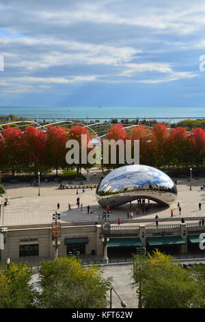 View of Cloud Gate, also known as 'The Bean', from an office building across the street during autumn at Chicago's Millennium Park. Stock Photo