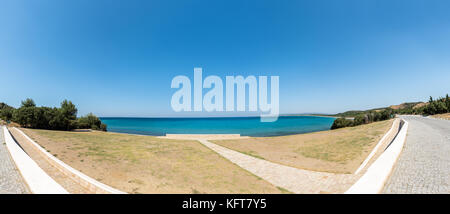 High Resolution panoramic view of Stone memorial on the beach at Anzac Cove in Gallipoli where allied troops fought in World War 1 in Canakkale Turkey Stock Photo