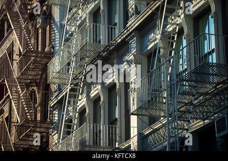 Architectural detail view of cast iron fire escapes in New York City Stock Photo
