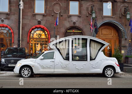 SAINT PETERSBURG, RUSSIA - 12 JANUARY 2017: Wedding limo - coach near the hotel Astoria Stock Photo