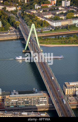 Severin bridge with Rhine and Frachschiff, Rhine bridge, green Pilon, Cologne, Rhineland, North Rhine-Westphalia, Germany, Europe, Cologne, aerial vie Stock Photo