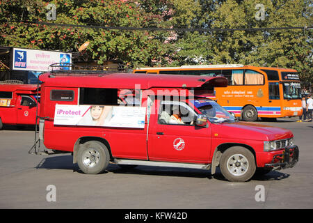 CHIANGMAI, THAILAND -JANUARY 10 2016: Red taxi Chiang Mai, For Passenger from Bus Station to City Center. Photo at Chiangmai bus station, Thailand. Stock Photo