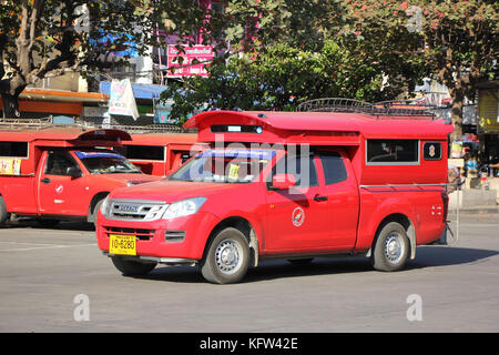 CHIANGMAI, THAILAND -JANUARY 10 2016: Red taxi Chiang Mai, For Passenger from Bus Station to City Center. Photo at Chiangmai bus station, Thailand. Stock Photo