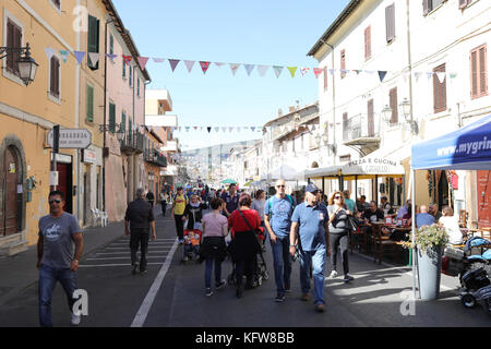 MANZIANA, LAZIO, ITALY - OCTOBER 14, 2017: Peopleon the streets celebrating one of the most popular and awaited local events, the festival of the loca Stock Photo