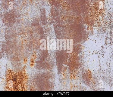 Old red painted wall with rust texture. Grunge rusted metal background. Rust stains. Stock Photo