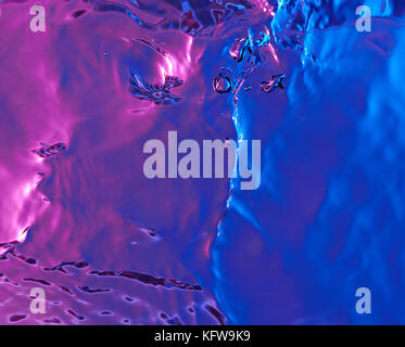 Close up of water surface colorful abstract background view from top Stock Photo