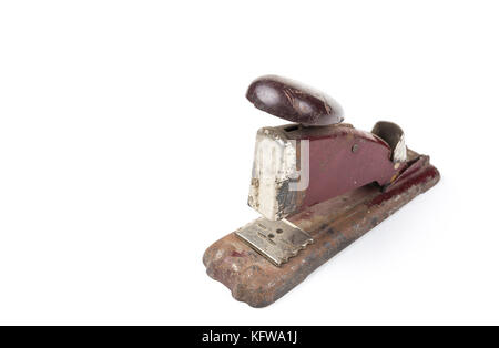 Old vintage retro metal stapler with staples isolated on white background Stock Photo