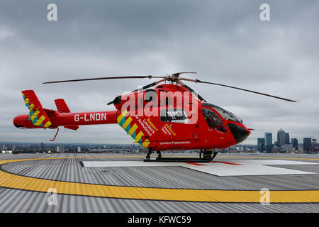 London Air Ambulance lands on the helipad of the Royal London Hospital Stock Photo