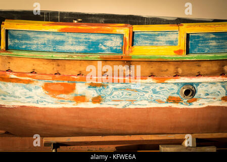 An abstract image from close up of paintwork on a traditional maltese fishing boat or luzzu Stock Photo