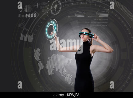 Young woman touching screen interface Stock Photo