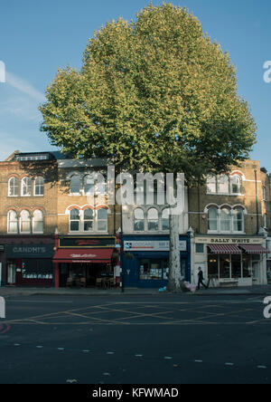 Shops and cafes on the strip of Kennington road, London Stock Photo