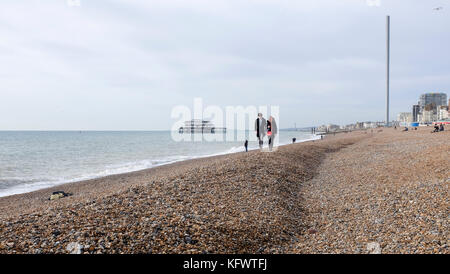 Brighton, UK. 1st November, 2017. A lovely morning for a stroll along Brighton beach in unusually warm Autumn weather today Credit: Simon Dack/Alamy Live News Stock Photo