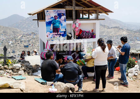 Celebration of All Saints' Day in a Lima Cemetery, Peru / Día de los Muertos en el Cementerio de Villa María del Triunfo, Lima, Peru. Stock Photo