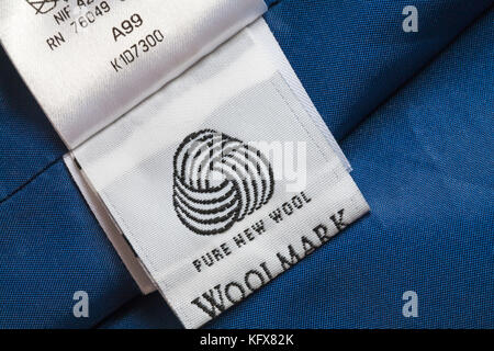 Woolmark Pure New Wool label inside coat Stock Photo: 25774577 - Alamy