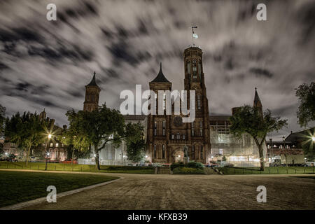 September 12, 2017, Washington, DC, USA: The Smithsonian Castle on the national mall looks quite spooky at night with clouds streaking past. Stock Photo