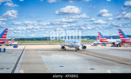 September 10, 2017, Washington, DC, USA: American airlines planes pull up the gates on a sunny day at Reagan National Airport in Washington. Stock Photo