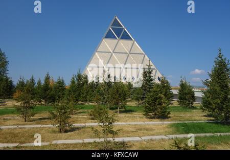 The Palace of Peace and Reconciliation (Pyramid of Peace and Accord) is a pyramid structure designed by British architects Foster and Partners Stock Photo