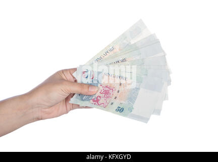 hand with Singapore banknotes dollars (50 SGD) isolated on a white background Stock Photo