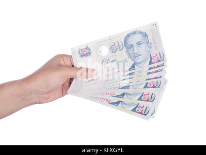 hand with Singapore banknotes dollars (50 SGD) isolated on a white background Stock Photo