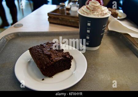 Hot chocolate in disposable paper cup isolated on white background ...