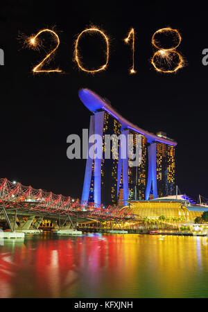 2018 Happy new year firework Sparkle with the Helix Bridge at night, urban landscape of Singapore Stock Photo