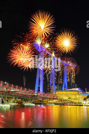 beautiful firework over the Helix Bridge at night, urban landscape of Singapore Stock Photo