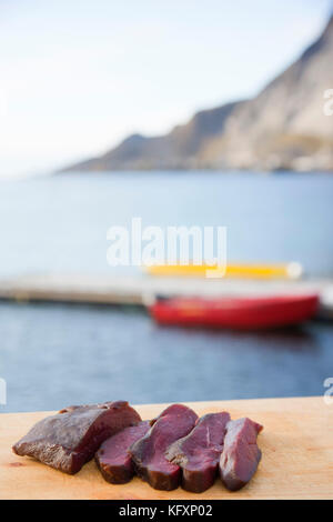 Minke whale meat (Balaenoptera acutorostrata), Reine, Lofoten, Norway Stock Photo