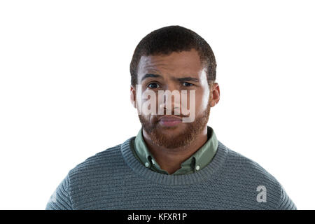 Portrait of confused man against white background Stock Photo