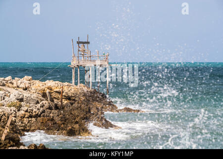 Traditional fishing tower, Peschici and the Gargano National Park. Italy. Stock Photo