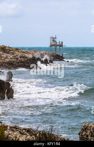 Traditional fishing tower, Peschici and the Gargano National Park. Italy. Stock Photo